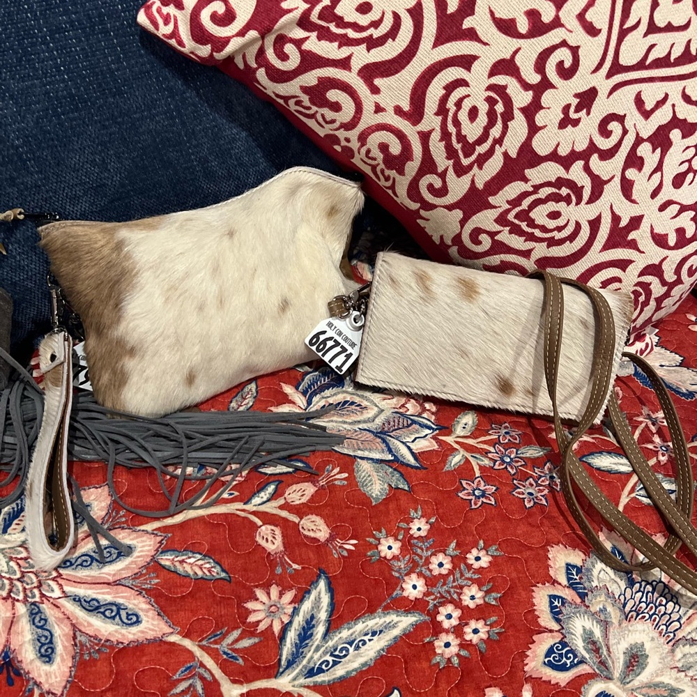 Cowhide Wristlet and Trail hand clutch